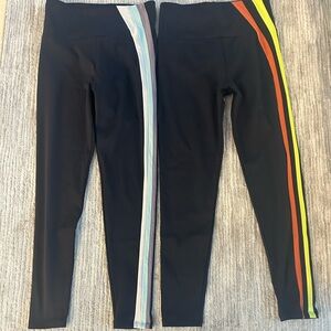 Noli Yoga Pants 2 pairs Black w/colored stripes Size Medium like new size Medium